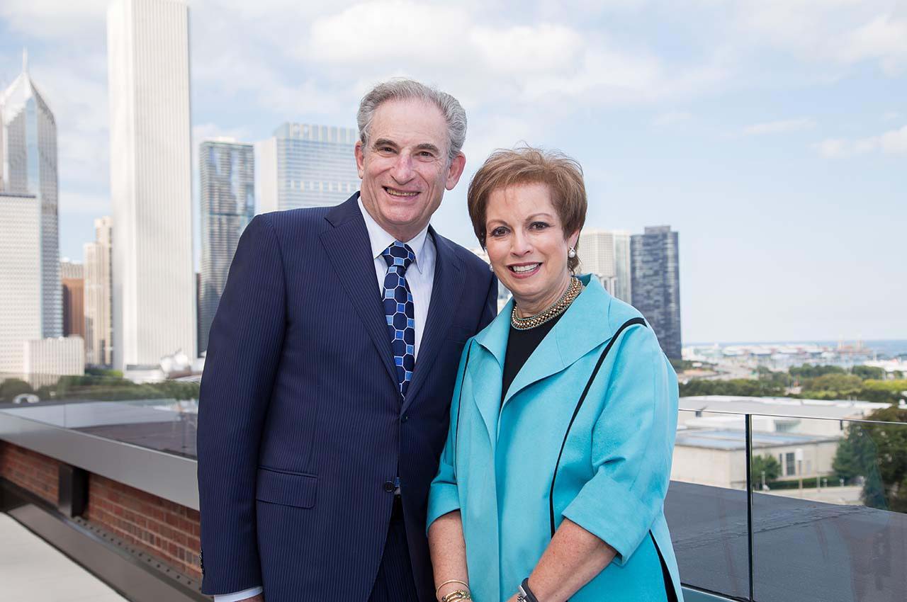 Ed and Carol Kaplan pose for a photo