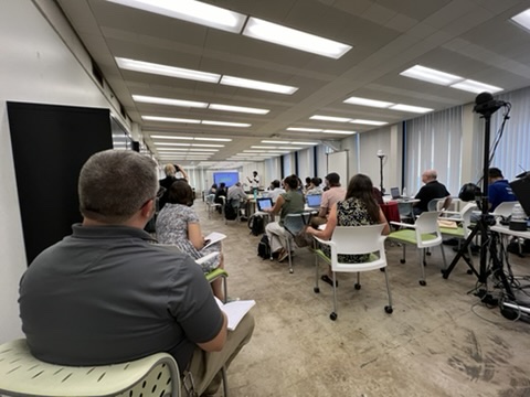 a long shot of particpants at the 2024 Symposium