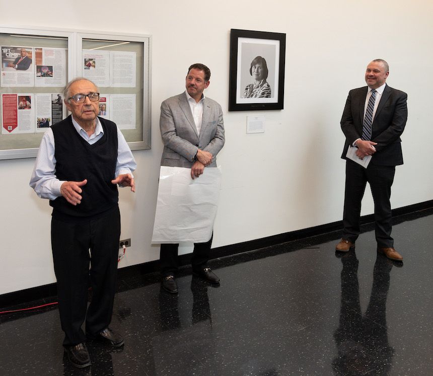 Serope Kalpakjian giving remarks, Louis Cattafesta and Kenneth Christensen stand to the right