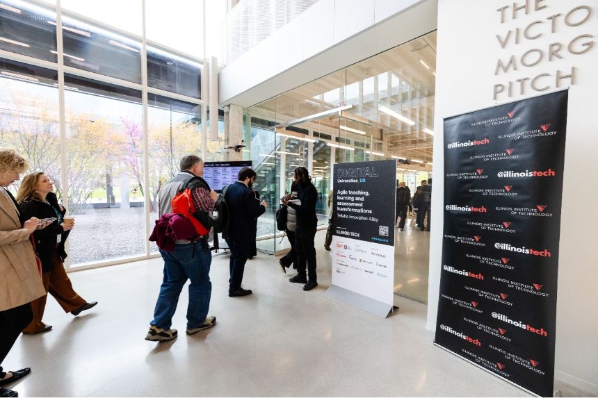 Attendees enter Tellabs for Times Higher Education Digital Universities US Conference