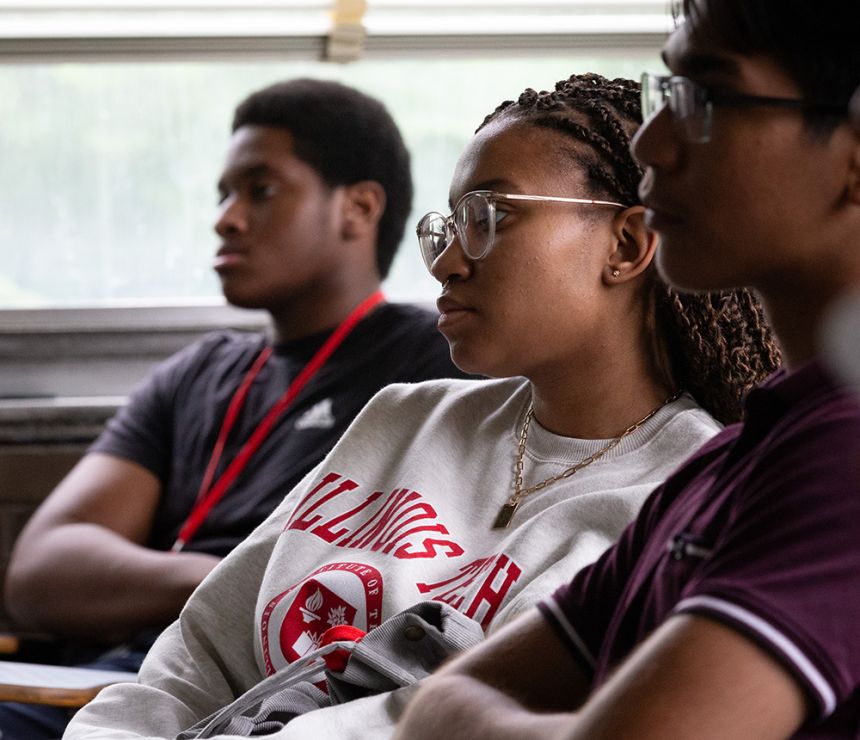 Participants in the psychology summer program listen in July 2023