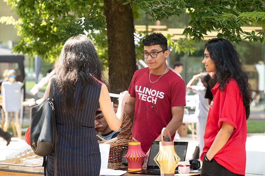 Illinois Tech students talk at the Involvement Fair during Welcome Week