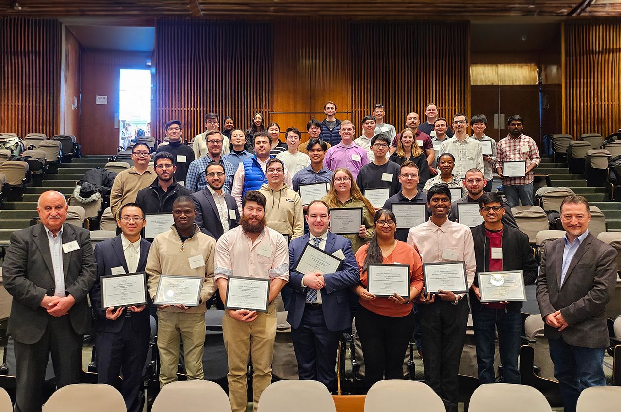 Group photo of ECE day winners with Jafar Saniie and Erdal Oruklu