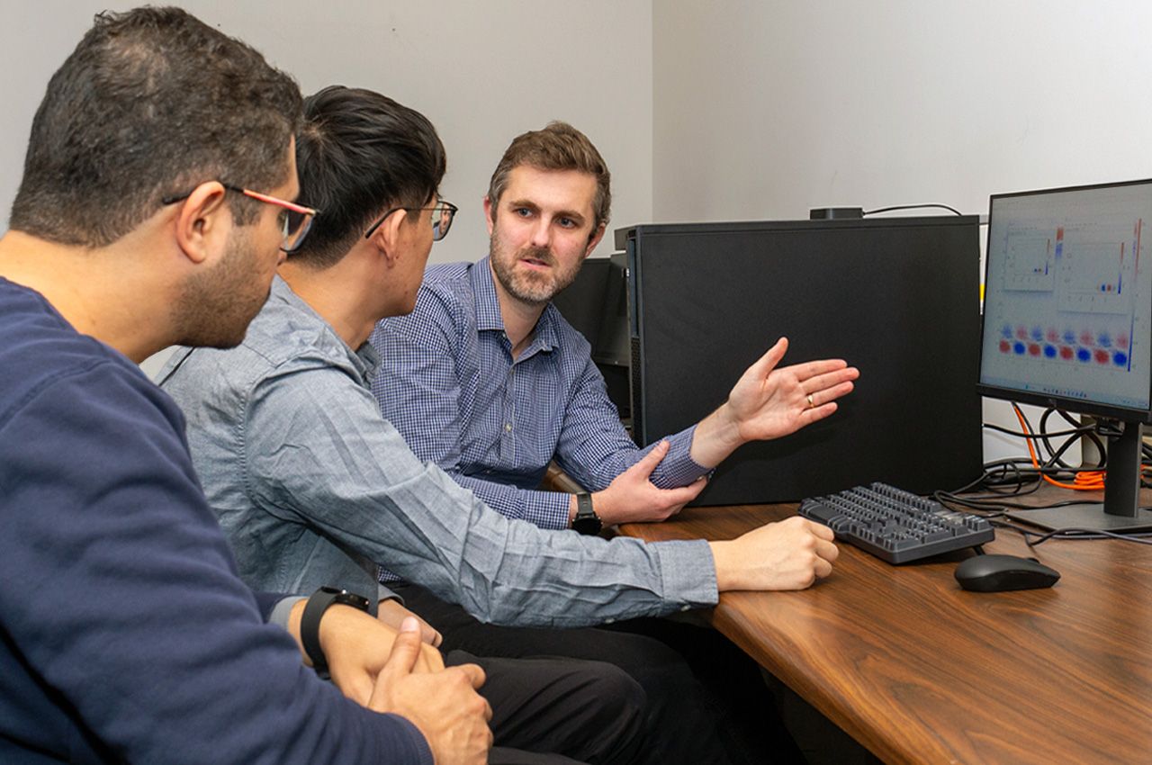 Photo of (from left to right) Ahmed El-Nadi (Ph.D. MAE Candidate), Min-Lin Tsai (Ph.D. MAE Candidate), and Assistant Professor Scott Dawson