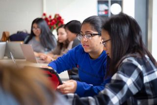 Students working on a tablet