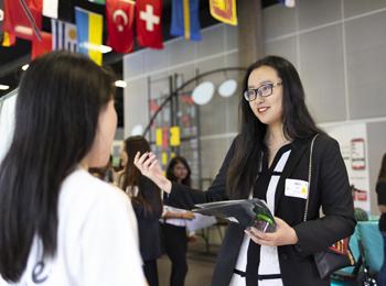 Career Fair - photo of Stuart School of Business student at a career fair in Hermann hall