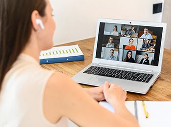 Woman on zoom call on laptop