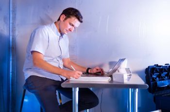 Brent Stephens conducts research in a lab