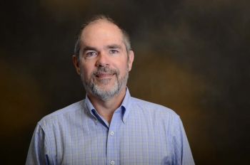 Headshot of J. D. Trout