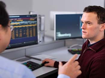 Student working in financial lab