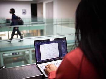 Student working on a laptop