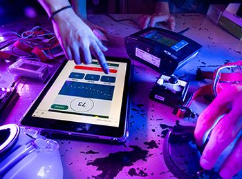 Illinois Tech students and faculty work in an engineering lab