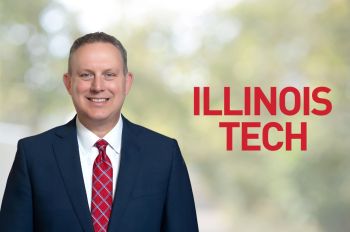 CFO Jeremy Fine wearing a suit next to the Illinois Tech logo