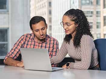 Stuart graduate students working together