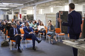 Stefano Ogrisek, partner at KW Forester ITALIA, speaks to students at the Margraf showroom in Chicago.