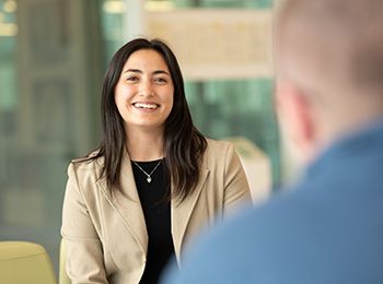 An Illinois Tech student talks with an Illinois Tech staff member