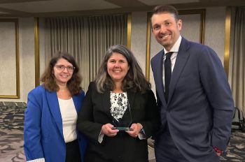 Michelle Vodenik accepts the 2025 Leonard Jay Schrager Award of Excellence