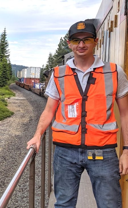 Photo of Daniel Rappoport in front of train