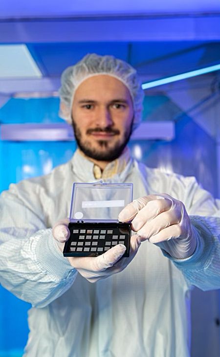 Image of Francesco Crisa holding qubits