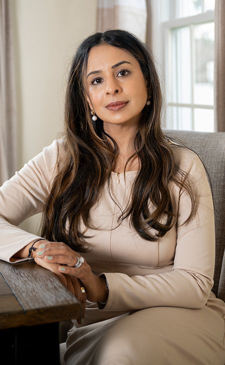 Swapna Sasidharan (M.A.S. ITM ’10) sits in her home office in the Chicago suburb of Schaumburg, Illinois.