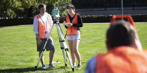 Students survey a plot of land for a civil engineering class