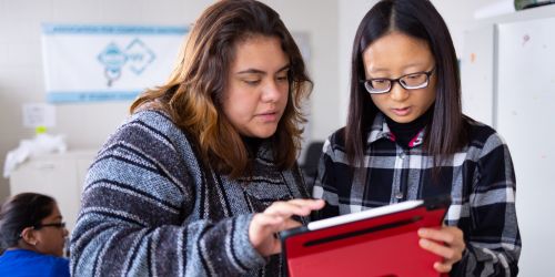 Photo of students with tablet computer