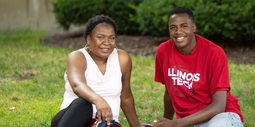 A photo of a current undergraduate student and his mother