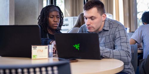 Students working at a desk