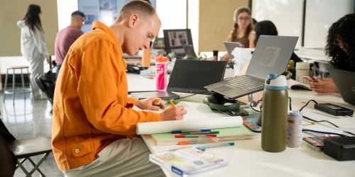An Illinois Tech student works in the College of Architecture’s S. R. Crown Hall