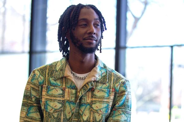 College of Architecture student Davey Friday poses in S. R. Crown Hall