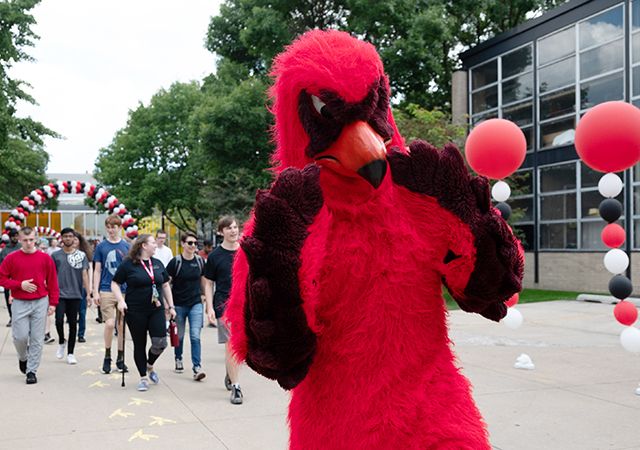 Illinois Tech's Scarlet Hawk leads students to Convocation