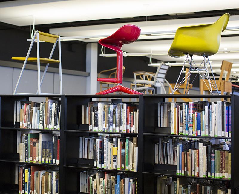 A photo inside the Graham Resource Centers showing books and chairs