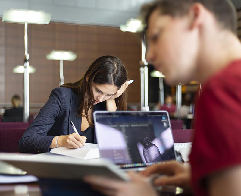 Photo of students studying inside Chicago-Kents library