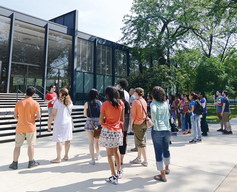 Visiting students and their family members on Main Campus outside of S. R. Crown Hall