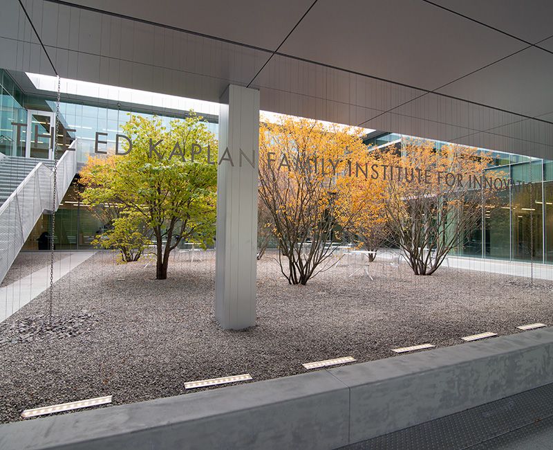 Kaplan Institute sign at the main entrance courtyard