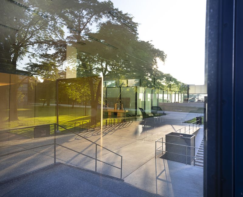 An abstract shot of reflections on a campus building