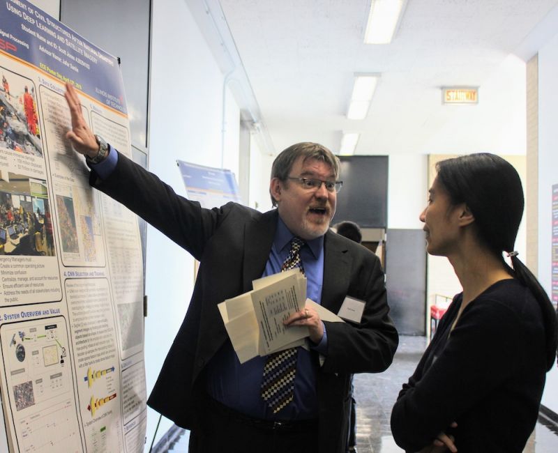 Photo of Scott Jones and Associate Professor Lin Cai