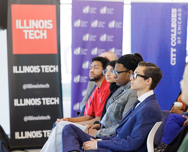 Students look on during a launch event for Runway 606 at Illinois Tech