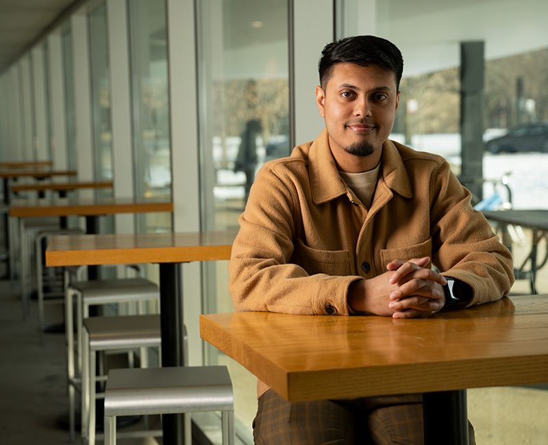 Illinois Tech alum Abrar Rafi sits in the MTCC